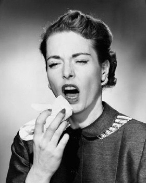 Close-up of a mid adult woman sneezing Poster Print - Item # VARSAL25523386
