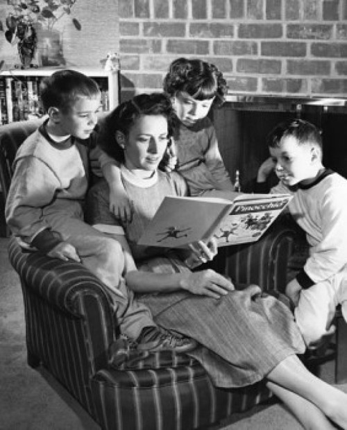 Close-up of a mid adult woman reading a storybook with her son and daughter Poster Print - Item # VARSAL2551413B
