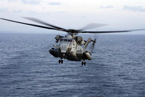 Pacific Ocean, October 3, 2011 - Marines practice takeoffs and landings from the amphibious assault ship USS Bonhomme Richard in an MH-53E Sea Dragon helicopter during Exercise Dawn Blitz. Poster Print - Item # VARPSTSTK104892M