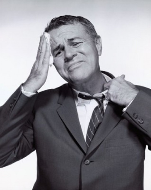 Mature man wiping his forehead with a handkerchief Poster Print - Item # VARSAL25518538B