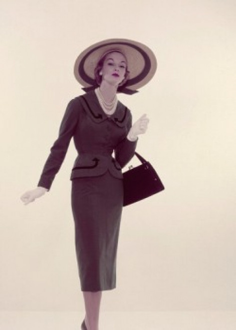 Studio portrait of young elegant woman carrying purse Poster Print - Item # VARSAL3844194