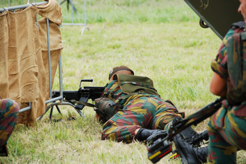A soldier of the Belgian Army on guard with his FN Minimi rifle Poster Print - Item # VARPSTJAE100194M