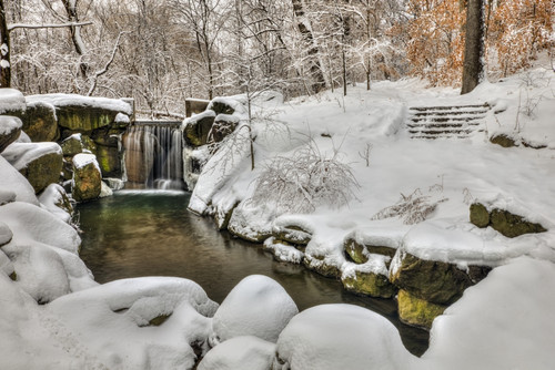 Snow-covered waterfall in The Loch, Central Park; New York City, New York, United States of America PosterPrint