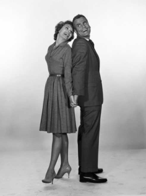 Happy mid adult couple holding hands  studio shot Poster Print - Item # VARSAL255417381A