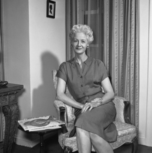 Portrait of mature woman sitting in armchair Poster Print - Item # VARSAL255420775