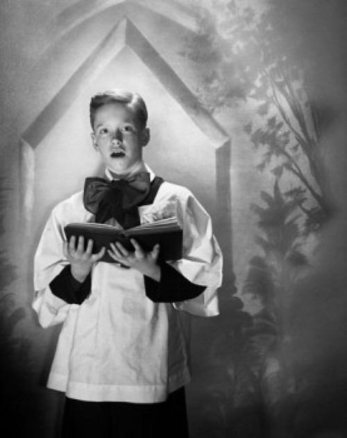 Choir boy holding a book and singing Poster Print - Item # VARSAL2553326