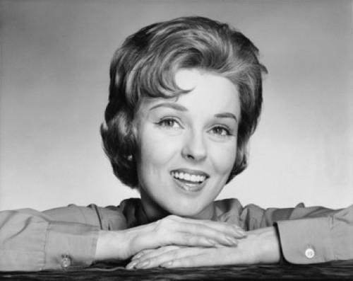 Portrait of a mid adult woman resting her chin on her hands Poster Print - Item # VARSAL25511504B