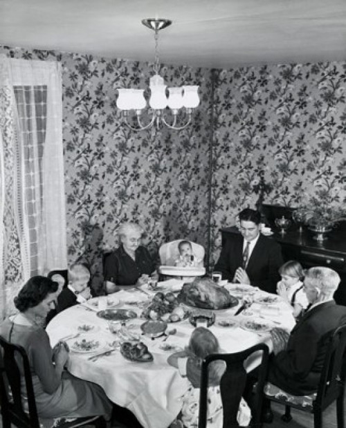 High angle view of a family praying at a dining table on Thanksgiving Day Poster Print - Item # VARSAL25539893