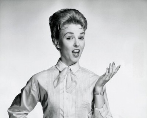 Portrait of a mid adult woman gesturing Poster Print - Item # VARSAL25511490