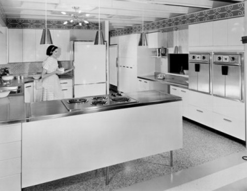 Young woman working in the kitchen Poster Print - Item # VARSAL25514633