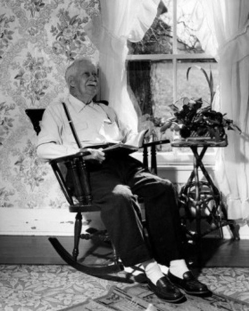 Senior man sitting in rocking chair Poster Print - Item # VARSAL2554285