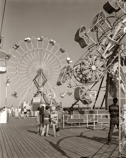 1960s Group Of Teens Looking At Amusement Rides On Pier Poster Print By Vintage Collection (22 X 28) - Item # PPI177382LARGE 1960s Group Of Teens Looking At Amusement Rides On Pier Poster Print By Vintage Collection (22 X 28) - Item # PPI177382LARGE