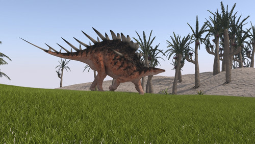 Kentrosaurus walking across a grassy field Poster Print - Item # VARPSTKVA600504P