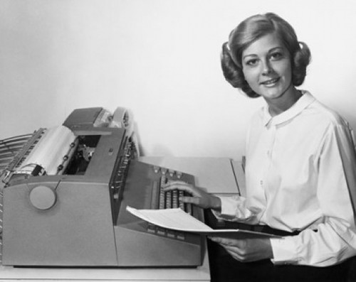 Young woman using a typewriter Poster Print - Item # VARSAL25548425