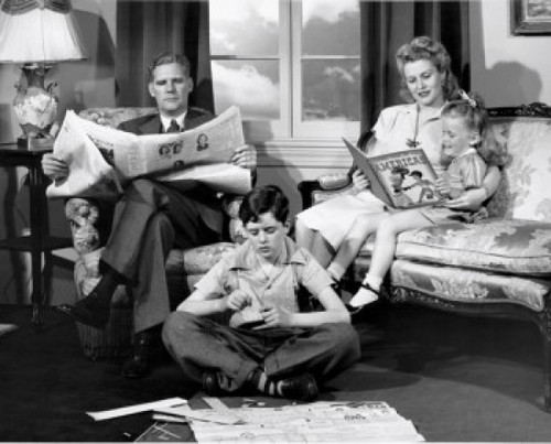 Parents and their children reading in the living room Poster Print - Item # VARSAL25513274