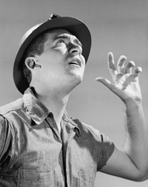 Close-up of a construction worker calling Poster Print