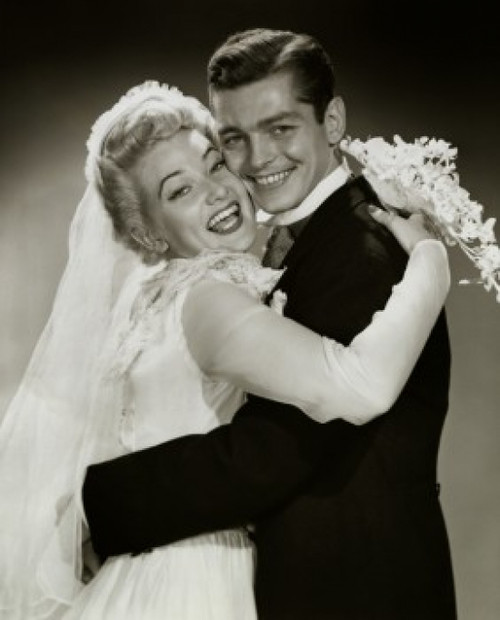 Portrait of a newlywed couple embracing Poster Print - Item # VARSAL255754