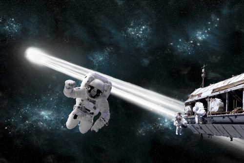 Artist's concept of an astronaut floating in outer space while his fellow astronauts work on a space station. A comet passes dangerously close to their location. Poster Print - Item # VARPSTMRC200111S