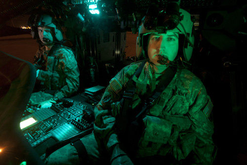Pilots sitting in the cockpit of a UH-60 Black Hawk helicopter at Davis Monthan Air Force Base, Arizona Poster Print - Item # VARPSTTMO100900M
