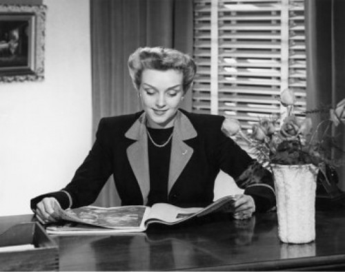 Close-up of businesswoman reading magazine Poster Print - Item # VARSAL25548449