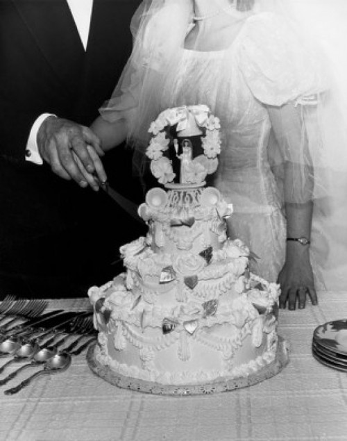 Mid section view of a newlywed couple cutting a wedding cake Poster Print - Item # VARSAL2554243