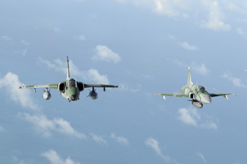 Brazilian Air Force A-1M and F-5EM taken in-flight during Exercise Cruzex Poster Print - Item # VARPSTRCN100100M