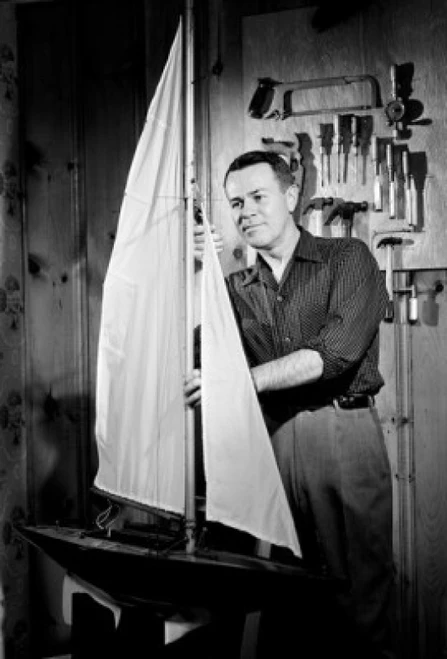 Man building model ship Poster Print
