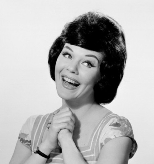 Close-up of a young woman smiling with her hands clasped Poster Print - Item # VARSAL25510567