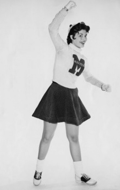 Portrait of female cheerleader standing and smiling Poster Print - Item # VARSAL2555056