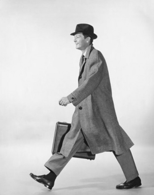 Side profile of businessman carrying briefcase Poster Print - Item # VARSAL25548132