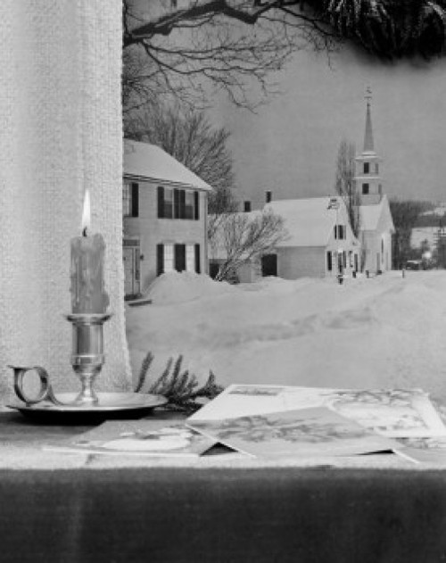 USA  Vermont  Waterford  Christmas candle and greeting cards on window sill  church in background Poster Print - Item # VARSAL255424064