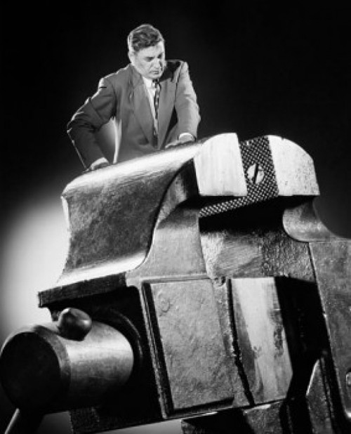 Close-up of a businessman standing in a vise grip Poster Print - Item # VARSAL2553131