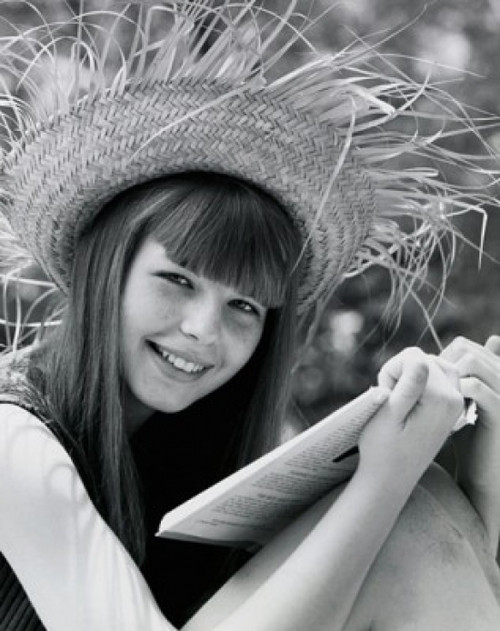 Portrait of a teenage girl holding a book and smiling Poster Print - Item # VARSAL25517526 Portrait of a teenage girl holding a book and smiling Poster Print - Item # VARSAL25517526