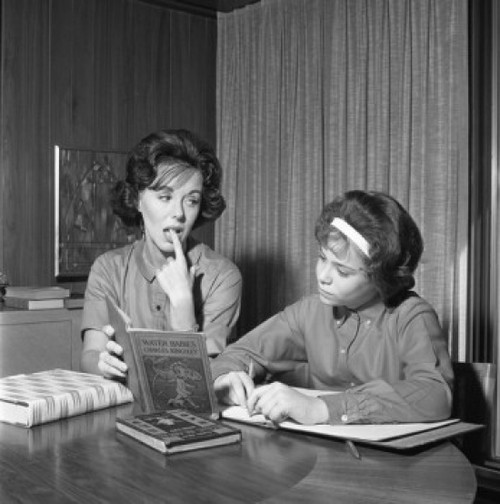 Mother helping daughter in homework Poster Print - Item # VARSAL255417395