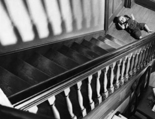 High angle view of a baby lying near a staircase Poster Print - Item # VARSAL25544583