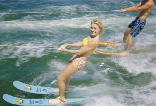 Young couple waterskiing in the sea Poster Print - Item # VARSAL3493402518