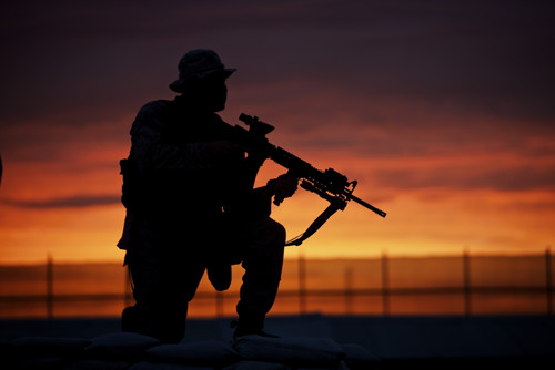 Silhouette of a U.S Marine on a bunker at sunset in Northern Afghanistan Poster Print - Item # VARPSTTMO100541M