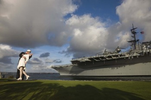 Sculpture Unconditional Surrender with USS Midway aircraft carrier  San Diego  California  USA Poster Print by Panoramic Images (24 x 16) - Item # PPI124731 Sculpture Unconditional Surrender with USS Midway aircraft carrier  San Diego  California  USA Poster Print by Panoramic Images (24 x 16) - Item # PPI124731