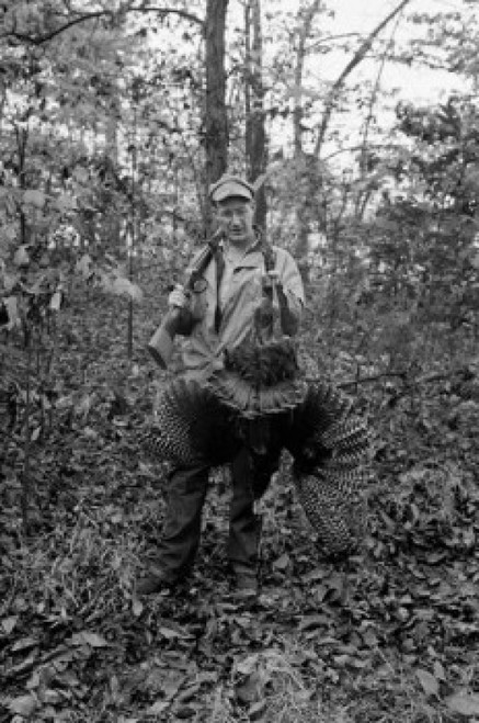 Hunter posing with dead peacock Poster Print - Item # VARSAL255423012