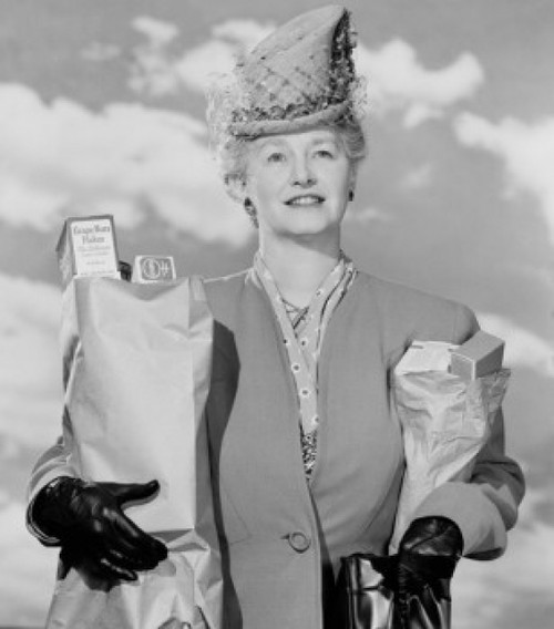 Woman carrying grocery bags outdoors Poster Print - Item # VARSAL255422957