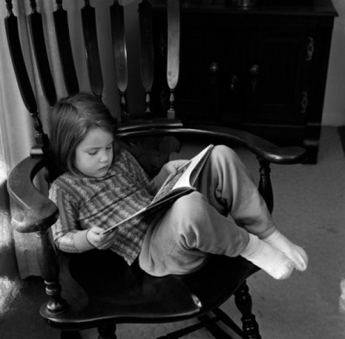 Girl on chair reading book Poster Print - Item # VARSAL255416516