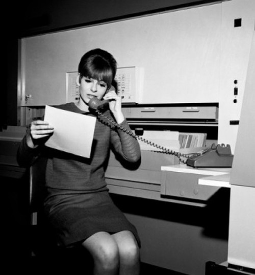 Young woman at office on the phone Poster Print - Item # VARSAL255417831