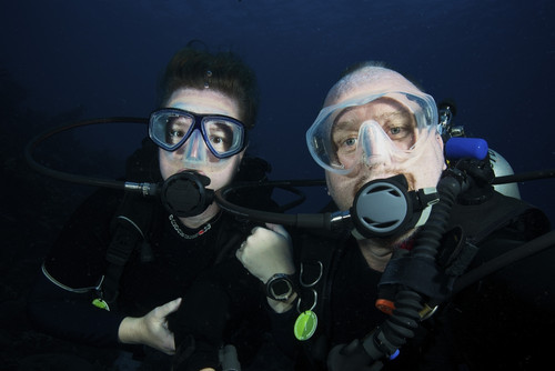 Scuba divers pose for the camera underwater, Bonaire, Caribbean Netherlands Poster Print - Item # VARPSTTMO400007U