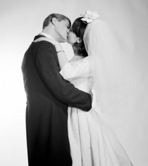 Newly married couple kissing Poster Print - Item # VARSAL255417709