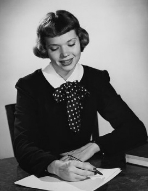 Young woman writing a letter Poster Print - Item # VARSAL25541972