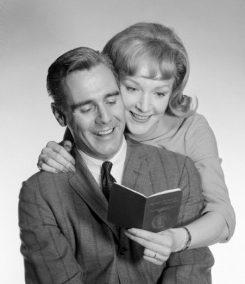 Mature couple holding passport Poster Print - Item # VARSAL255416522