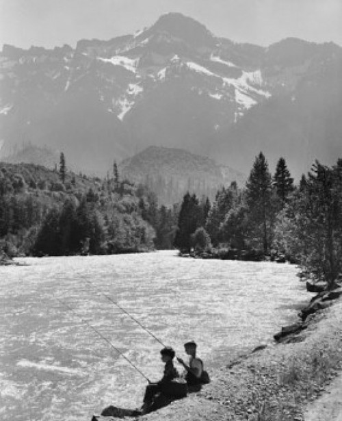 Two boys fishing at a riverside Poster Print - Item # VARSAL25514874