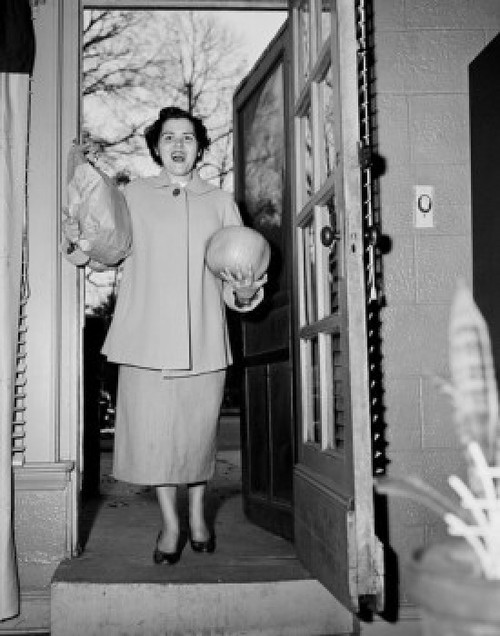 Woman with shopping in doorway Poster Print - Item # VARSAL255422400