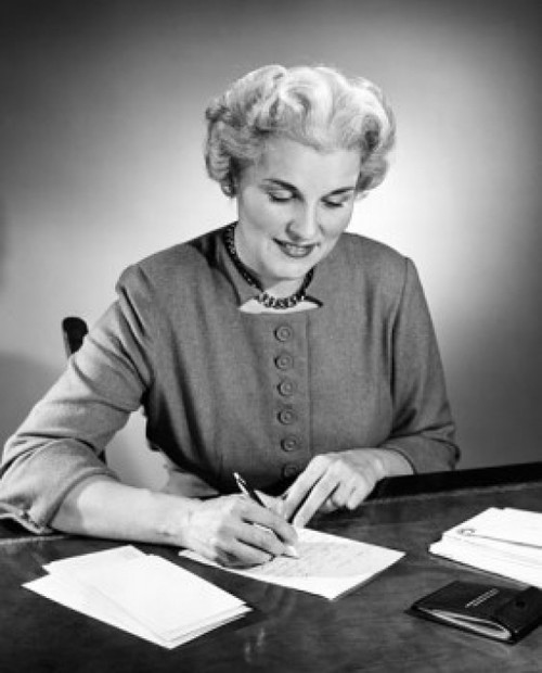 Senior woman sitting at table and writing Poster Print - Item # VARSAL255912