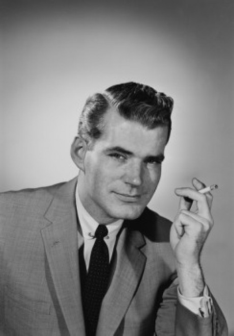 Portrait of young man smoking cigarette Poster Print - Item # VARSAL255421273
